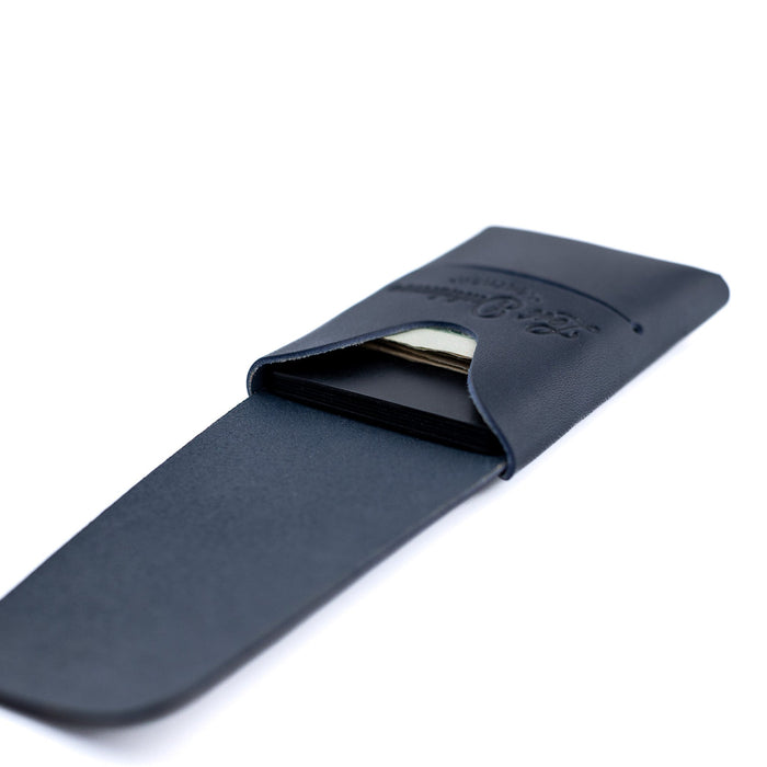 Navy blue leather strap with a clasp on a white background