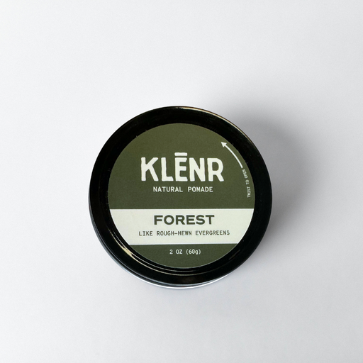 Klénr natural pomade container labeled 'Forest' on a white background