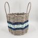 Woven basket with striped pattern on a white background
