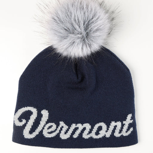 Navy blue beanie with 'Vermont' text and gray faux fur pom-pom on a white background