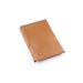 Brown leather notebook on a white background