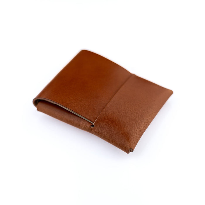 Brown leather wallet on a white background