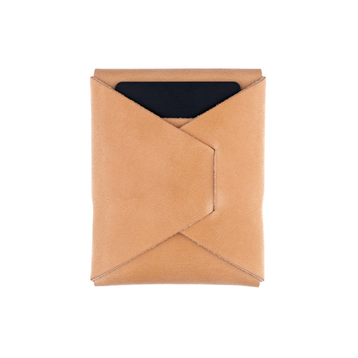 Tan leather wallet with a black interior on a white background