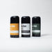 Three deodorant sticks with different labels on a white background