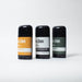 Three deodorant sticks with different labels on a white background
