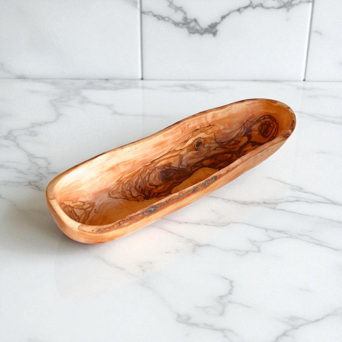 Wooden serving tray on a marble surface