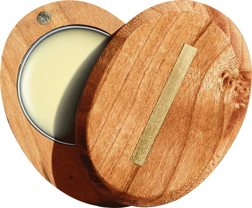 Wooden container with a lid open, revealing a yellowish substance inside.
