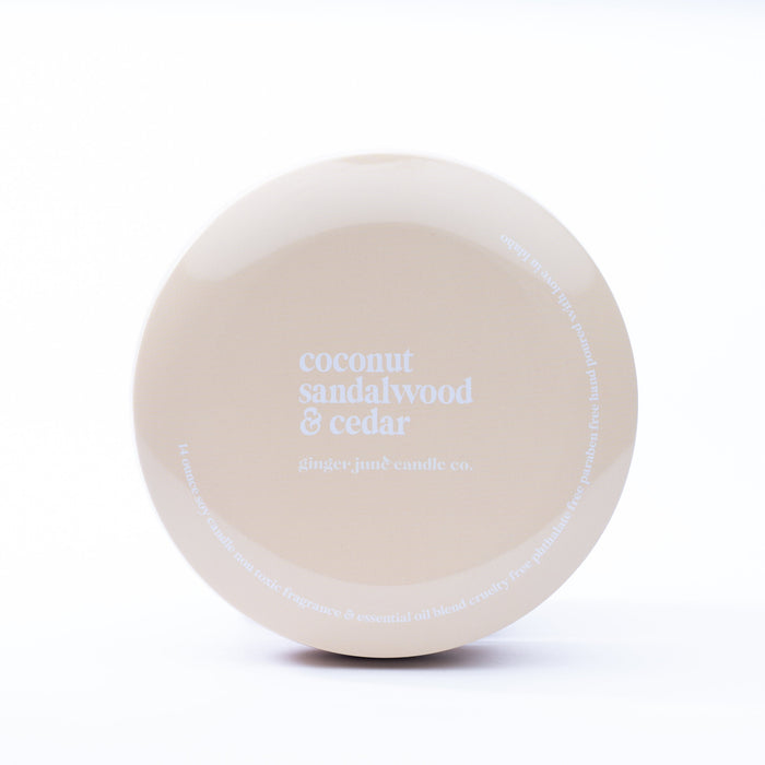Nude Tin: coconut sandalwood + cedar  14 oz candle